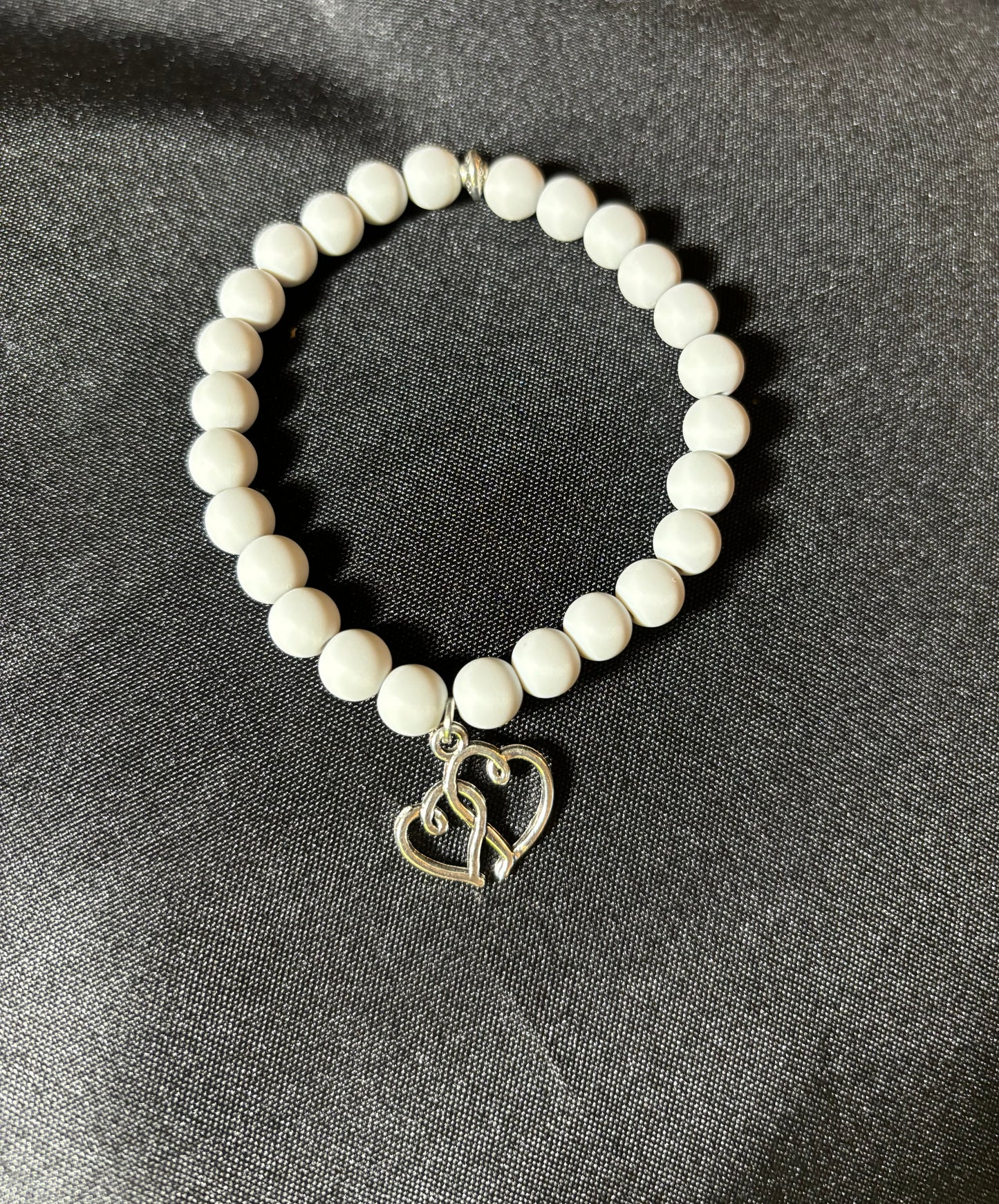 GREY CLAY BEAD WITH CHARM