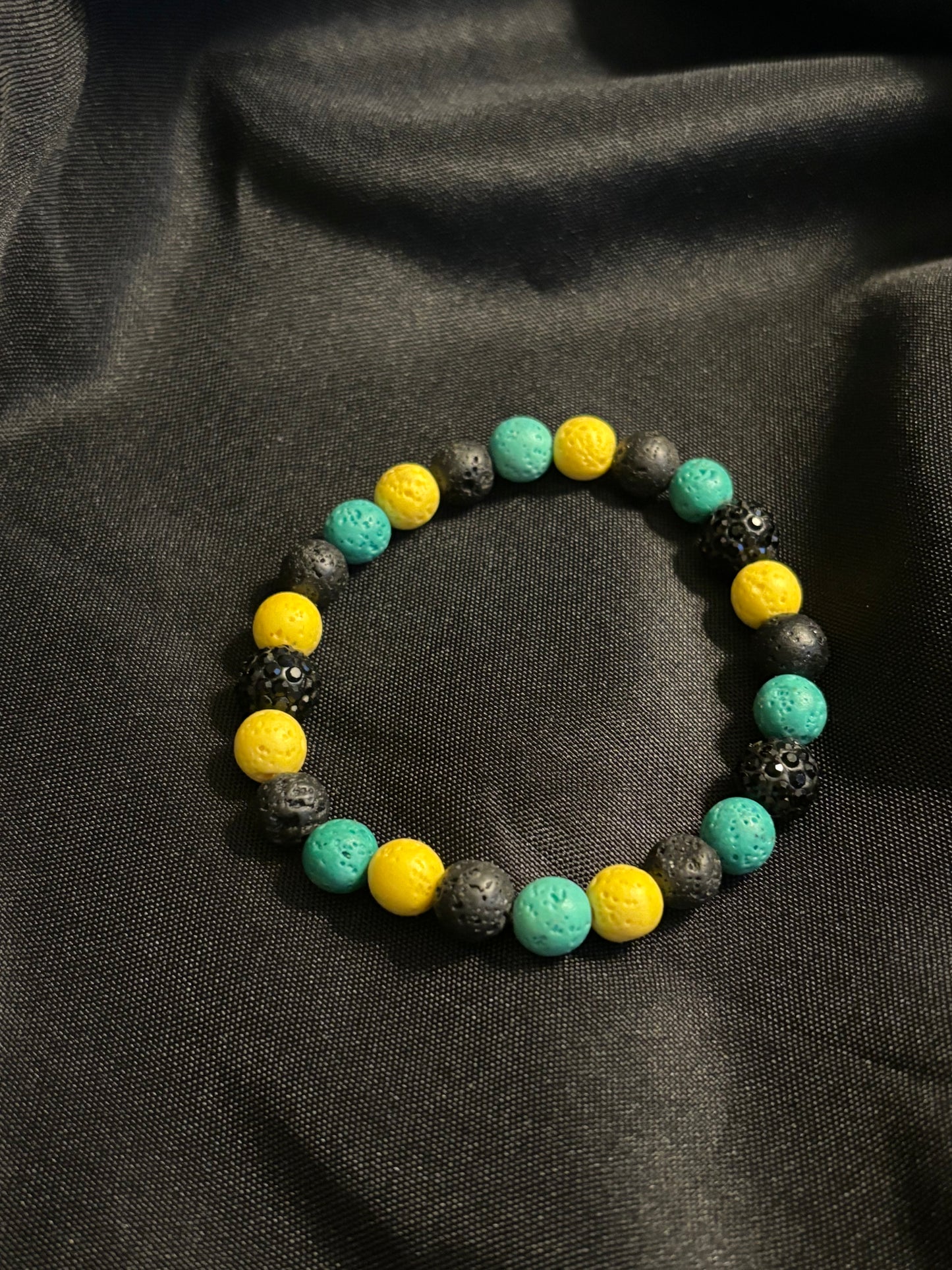 GREEN,BLACK AND YELLOW LAVA STONE