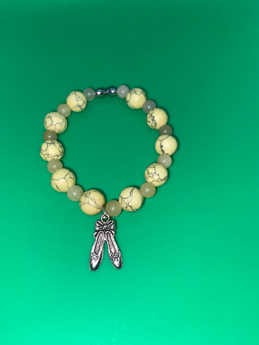 YELLOW BALERINA  AVERAGE SIZE! FITS SMALL TO MEDIUM  WRISTS