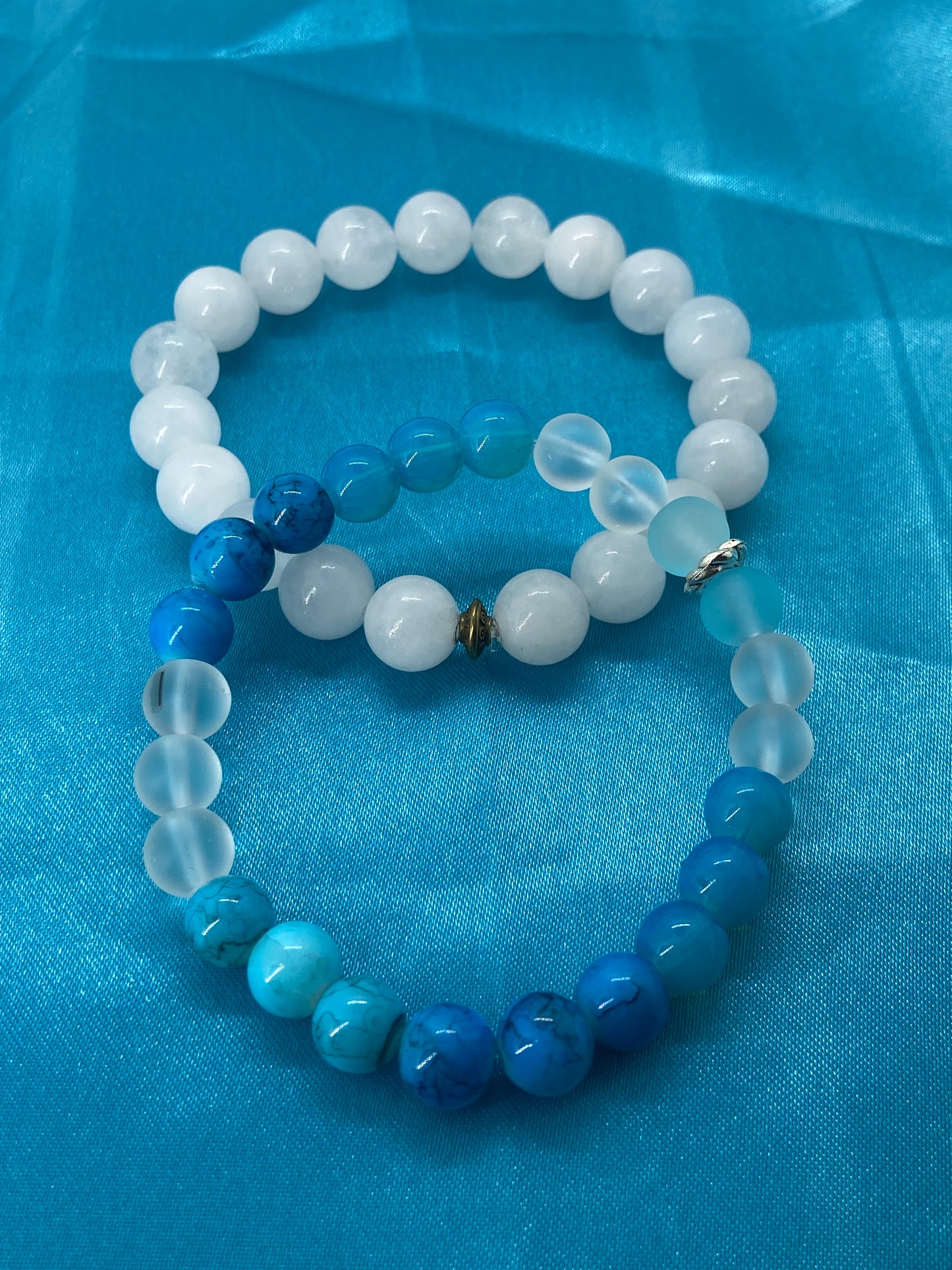 WHITE QUARTZ AND BLUE GEMSTONE SET OF TWO