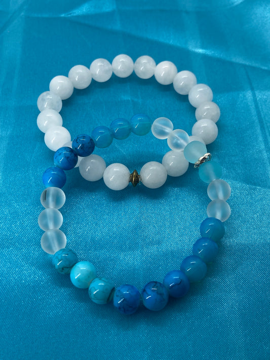 WHITE QUARTZ AND BLUE GEMSTONE SET OF TWO